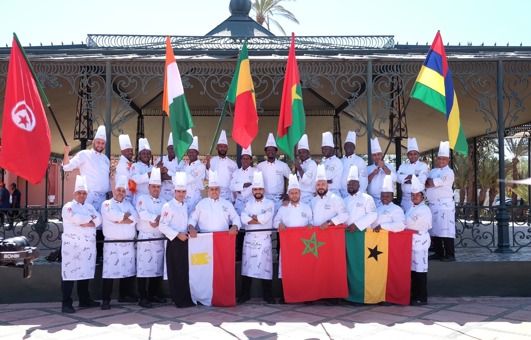 Delegations gathered with their national flags, TOC Afrique 2024, Marrakech